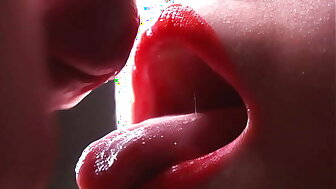 Close-up pussy fuck fetish. Cum on red lips in lipstick. Slow motion